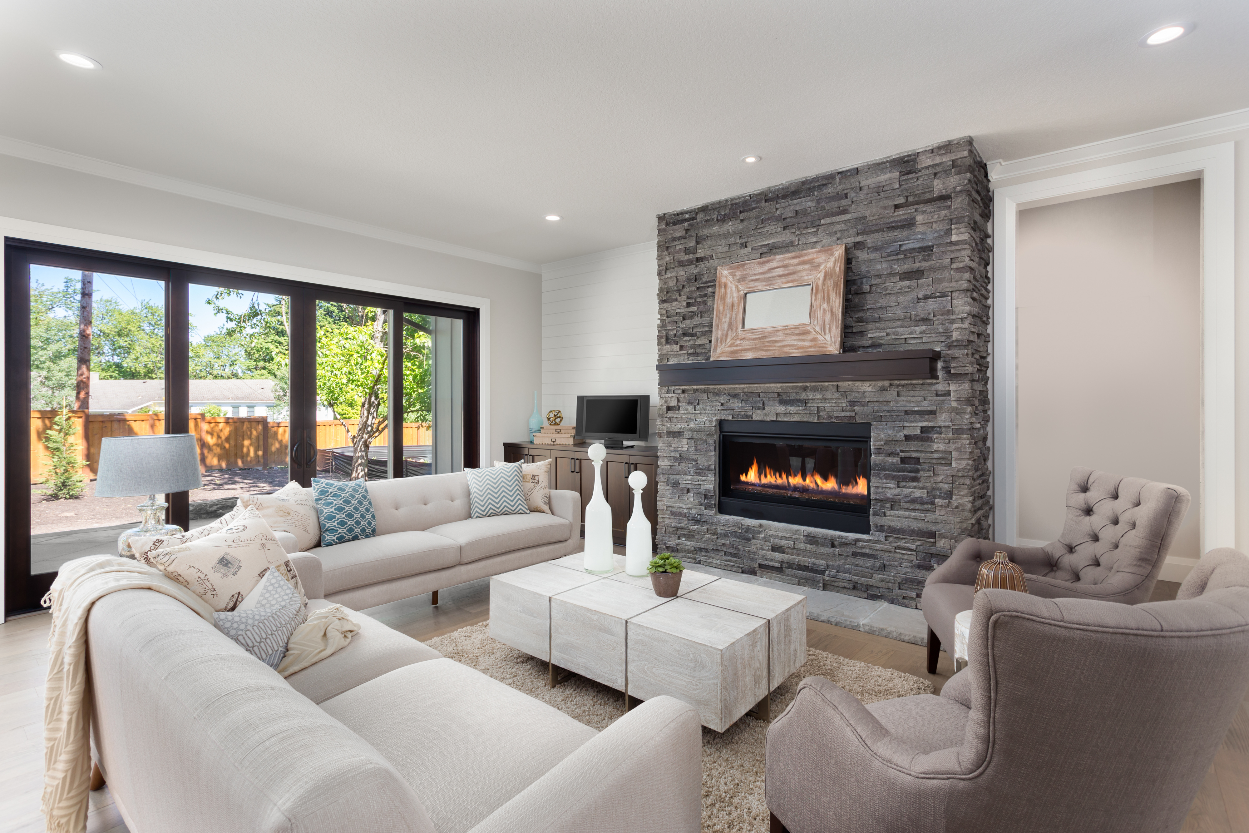 furnished living room in newly constructed luxury home